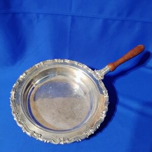 Elegant Silver Serveware with Wooden Handle